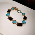 Vintage vergoldetes Armband mit rechteckigen dunklen Steinen und runden Türkis-Besätzen - Armband (8)