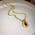 Vintage-Goldhalskette mit Schlangenkette und einem tropfenförmigen Granat-Edelsteinanhänger - Roter Edelstein Anhänger Halskette (10)