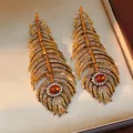 Luxury amber peacock feather drop earrings with sparkling rhinestones in a gold finish - Gold Coffee Yellow (50#)