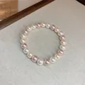 Bracelet élégant en perles multicolores aux tons rose, blanc et crème très doux - Série Rose 8mm / Série Rose
