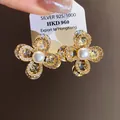 Elegant gold-toned flower earrings featuring sparkly zirconia and lustrous white pearls - Gold Real Gold Plating (56#)