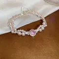 Elegant French style adjustable pearl bracelet featuring a central pink gemstone. - 57# Bracelet Two-Row Round Pink Main Stone Style / Pink