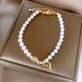 Détail d'un élégant bracelet en perles avec un motif de tête de serpent en cristal - Bracelet Perle Serpent se Mordant la Queue (54#) / Or-Rose
