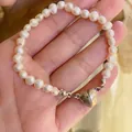 Bracelet de perles élégant de style français avec fermoir magnétique en cœur pour femme - Style Fil Invisible Fermoir Magnétique Cœur / Blanc