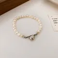 Vintage irregular baroque pearl bracelet with a silver heart magnetic clasp for women - Pearl Magnetic Style