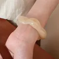 Elegant cream wavy acrylic bangle bracelet for women, minimalist and chic resin jewelry - Wave Shape (HB3743-1) / Light Coffee