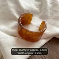 Amber marbled acrylic open cuff bracelet with 5.5cm inner diameter and 3.5cm width - ID 5.5cm, Width 3.5cm / Brown