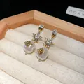 Elegant vintage gold star earrings featuring white pearl drops and golden bee accents - Bee Pearl Style (17) / Gold-White