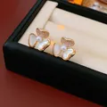 Elegant gold butterfly stud earrings featuring white mother of pearl and central pearls - Butterfly Shell Style (16) / Gold