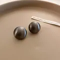 Chic gunmetal grey brushed metallic dome stud earrings with a geometric minimalist design - Geometric Circle Silver