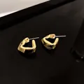 Elegant irregular geometric gold hoop earrings with unique crumpled metal texture - Irregular Wrinkled Hoop