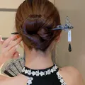 Eleganter Retro-Holzhaarstab mit Schmetterlingsanhänger für traditionelle Hanfu-Frisuren. - Schwarzer Schmetterling