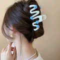 Elegant white wavy hair claw clip featuring cute blue heart decorations for women - Heart Embellished Wave Style / White Light Blue