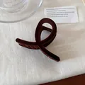 Elegant dark brown velvet hair claw clip featuring a minimalist cross loop design - Cross Flocking Style / Deep Coffee