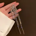 Close-up of sparkling silver-tone long tassel earrings with dense rhinestone details - Fine Dense Multi-layer Long Tassel (Style 11)