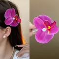 Elegant purple orchid floral hair clip with pearl detail for women's hair styling - Artificial Pearl Orchid Style / Purple