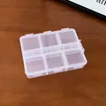 Detailed view of a 6-compartment portable transparent plastic jewelry storage box - 4# Storage Box - 6 Grids