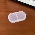 Macro view of a portable transparent plastic jewelry storage box with dual compartments - 7# Storage Box - Oval