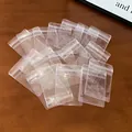 Detailed view of the ziplock closure on transparent mini jewelry storage bags - 8# Packaging Bag - Small / 10 Pieces/Pack (4x6cm)