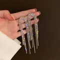 Exquisite silver-toned tassel earrings with full rhinestone bow design for elegant style. - Multi-layer Rhinestone Tassel (Style 6)