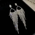 Exaggerated long silver tassel drop earrings with sparkling full rhinestone inlay. - Water Drop Clasp Rhinestone Tassel (Style 49)
