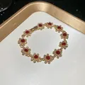 Vintage floral gold-plated chain bracelet with sparkling red and white rhinestone crystals - Bracelet-Gold-Red