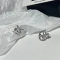Elegant silver-tone non-pierced ear cuffs featuring a sparkling cubic zirconia X-shape design - Cross Geometric Rhinestone Ear Cuff Set (27)