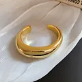 Elegante bracciale rigido aperto dorato minimalista con finitura lucida per donna - Ovale Irregolare (20# Oro)
