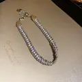 Elegantes silberfarbenes mehrreihiges Kristallarmband mit Herzanhängern - Silber
