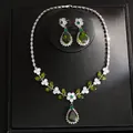 Elegant vintage jewelry set with green water drop pendants and white floral accents - Necklace And Earrings Set (15#) / Silver-Green