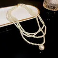Detailed close-up of elegant multi-layered pearl necklace with a large round pendant - Multi-layer Style (2#)