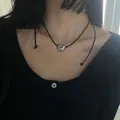 Close-up of a minimalist polished silver heart pendant necklace on a thin black cord. - 17# Simple Heart Style (17#) / Silver-Black Heart
