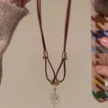 Retro punk leather cord necklace with a distressed rhinestone sunburst star pendant. - 7# Starburst Pendant Style (7#) / Gold Brown