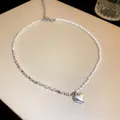 Asymmetric necklace with half pearls and half silver beads featuring heart pendant - Asymmetric Heart Style (12#)