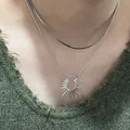 Detailed view of punk sunburst pendant necklace styled with a flat herringbone chain - 23# Snake Chain Style (23#) / Silver Double Layer