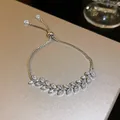 Detail view of a sparkling marquise-cut zircon leaf bracelet with an adjustable sliding closure - 7. Zircon Willow Leaf Bracelet.