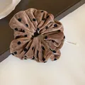 Elegant brown corduroy oversized hair scrunchie featuring trendy black polka dots - Scrunchie / Coffee Flocked Polka Dot