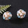 Close-up macro view of delicate blue and white ceramic flower stud earrings with rhinestones - Colorful Floral Cluster Studs (8# Silver Pin-Regular-Blue)