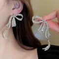Elegant silver rhinestone bow earrings with ribbon tassels for a high-end luxury look - Bow Ribbon Style (46#)