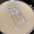 Elegant crescent moon and star dangle earrings with pearl and waterdrop crystal tassels. - Crescent Star Tassel Style (52#)