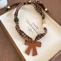 Vintage cloth-print strap necklace with brown leather bow pendant for autumn style - Coffee Plaid