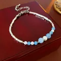 Elegant French vintage bracelet with pearls, blue stones, and silver beads - Gradient Blue Stone Bead Style / Blue