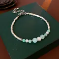 Vintage French pearl bracelet with elegant mint green beads and silver faceted chain. - Silver Mint Green Gradient Style / Light Blue