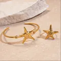 Conjunto de brazalete y anillo de estrella de mar dorada con diseño minimalista inspirado en el mar - Estilo de Forma de Espiral de Estrella de Mar (139#) / Set de dos piezas / Dorado