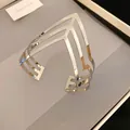 Brazalete rígido ancho de plata con diseño geométrico calado de estilo minimalista - Estilo geométrico calado en V (109#) / Plateado
