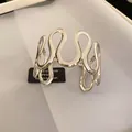 Elegante brazalete de metal plateado minimalista con un diseño geométrico ondulado - Estilo geométrico ondulado (102#) / Plateado