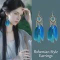 Vintage bohemian feather tassel earrings with blue feathers and turquoise accents - Dark Blue Feather Pendant (HE20859-1)