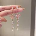 Boucles d'oreilles papillon en cristal rose élégantes avec glands scintillants. - Style Gland Papillon (6)