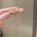 Élégantes boucles d'oreilles nœud en cristal rose avec de longs glands feuilles pour femme - Style Gland Arête de Poisson (7)