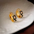 Vintage black enamel hoop earrings with gold plating and white heart patterns on white plate - 29# Ear Buckle - Gold Flower Style (Real Gold Plated)
